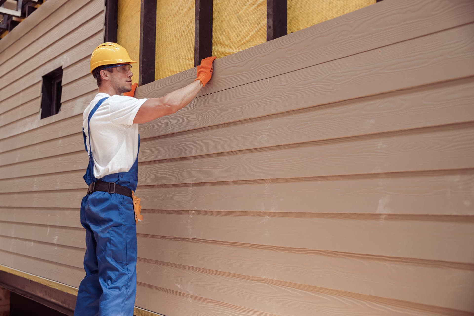 Exterior siding installation in progress
